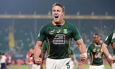 South Africa's James Murphycelebrates a try against Australia on day one of the Dubai Emirates Airline Rugby Sevens at The Sevens Stadium