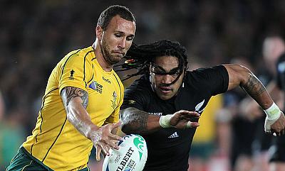 Quade Cooper (left) will start at fly-half for Australia