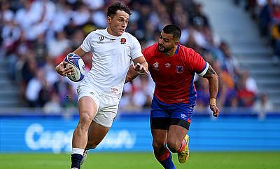 Henry Arundell of England runs with the ball whilst under pressure from Franco Velarde of Chile