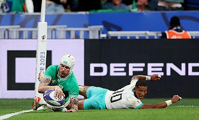 Mack Hansen of Ireland scores his team's first try during the Rugby World Cup game against South Africa