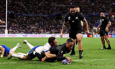 Aaron Smith of New Zealand scores his team's fifth try during the Rugby World Cup game against Italy
