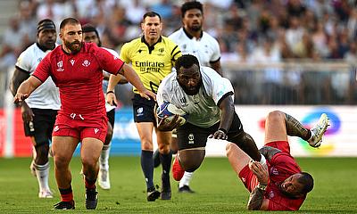 Luke Tagi of Fiji is tackled by Beka Gigashvili of Georgia during the Rugby World Cup game
