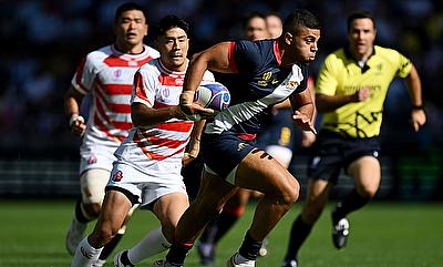 Santiago Chocobares of Argentina breaks with the ball to score his team's first try during the Rugby World Cup game against Japan