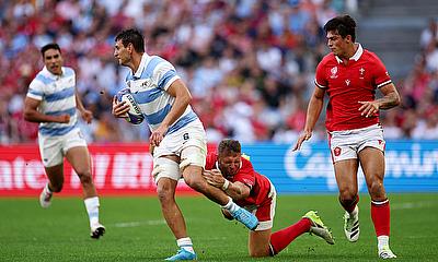 Juan Martin Gonzalez of Argentina is tackled by Dan Biggar of Wales during the Rugby World Cup quarter-final