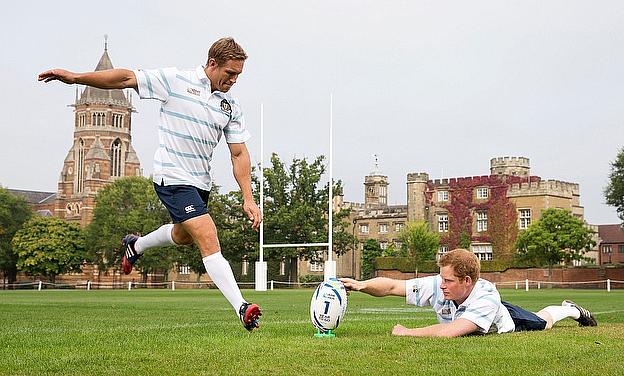 Prince Harry helps Rugby World Cup 2003 winner and England 2015 Ambassador Jonny Wilkinson take a kick