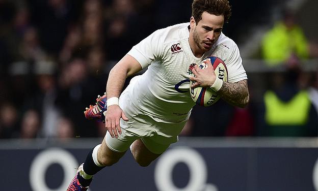 Danny Cipriani dives home for a try on his first Test appearance at Twickenham in seven years