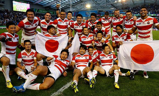 Japan's players celebrate their stunning victory