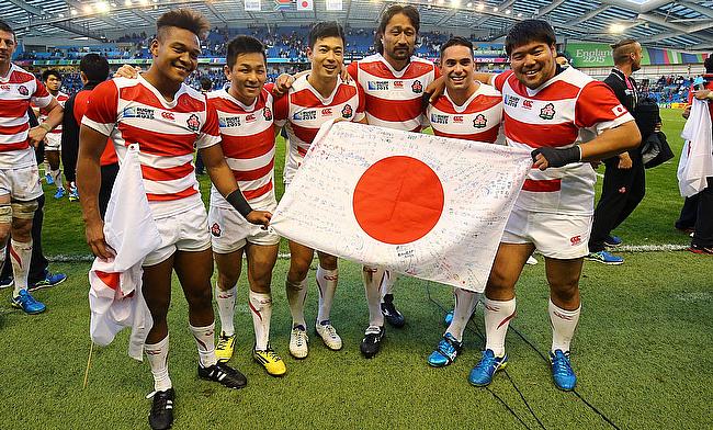 Japan players celebrate their stunning World Cup victory over South Africa in Brighton