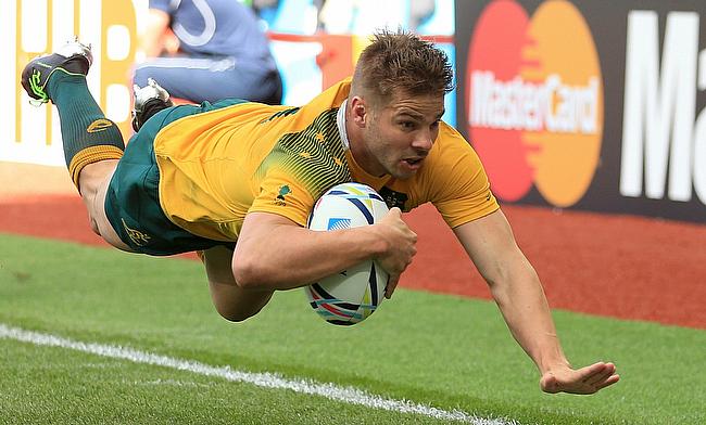 Drew Mitchell crosses for another Australia try