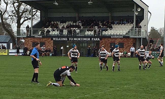 A kick is lined up during the Luctonians-Sedgley Park Tigers clash