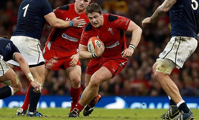 Wales prop Rhodri Jones will join the Ospreys from the Scarlets at the end of the season.