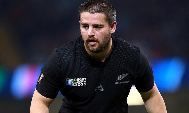 Hurricanes captain Dane Coles left the field looking in pain early in the second half