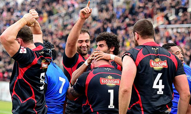 Georgia celebrating their 20-16 win over Samoa