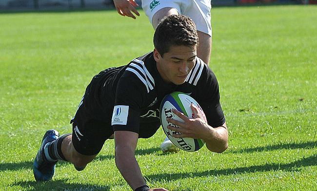New Zealand fly-half Tiaan Falcon dives over to score one of their 11 tries against Ireland at AIA Arena