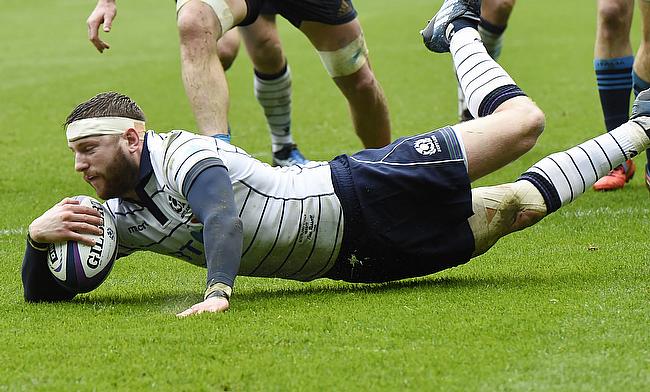 Duncan Taylor, Finn Russell, pictured, and Hamish Watson crossed for Scotland
