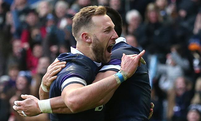 Byron McGuigan (left) scored the opening try for Scotland