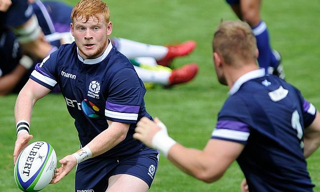 Scotland hooker Robbie Smith passes during their ninth place semi-final with Ireland on day four of the World Rugby U20 Championship 2018