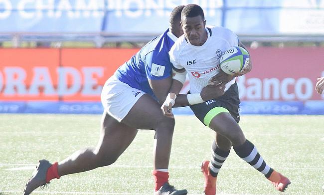 France's Jordan Joseph tries to stop another Fiji attack in their Pool A match at the Racecourse Stadium in Rosario on day one of the World Rugby U20