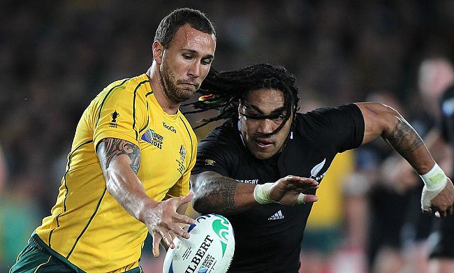 Quade Cooper (left) will start at fly-half for Australia