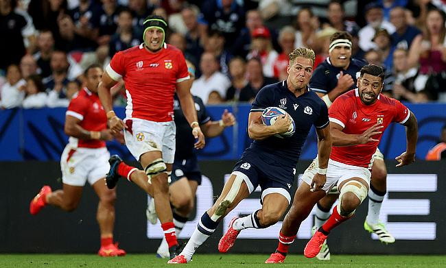 Duhan van der Merwe of Scotland breaks with the ball during the Rugby World Cup game against Tonga