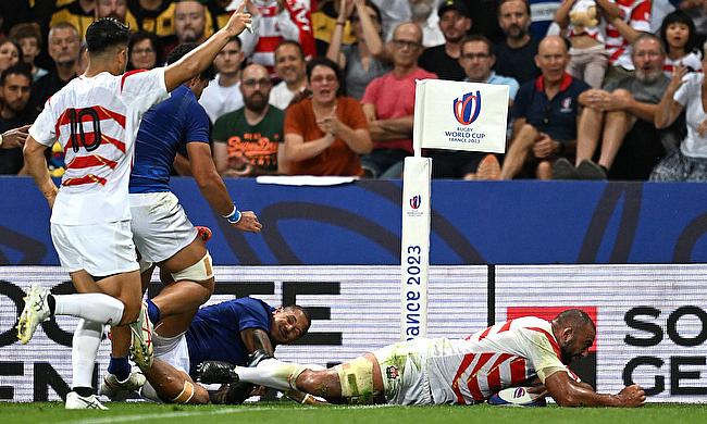 Michael Leitch of Japan scores his team's second try during the Rugby World Cup game against Samoa
