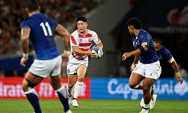 Rikiya Matsuda of Japan runs with the ball during the Rugby World Cup game against Samoa