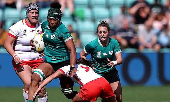 Grace Moore of Ireland is tackled by Anne Fernandez de Corres of Spain during the Women's Rugby World Cup 2025 Pool C match