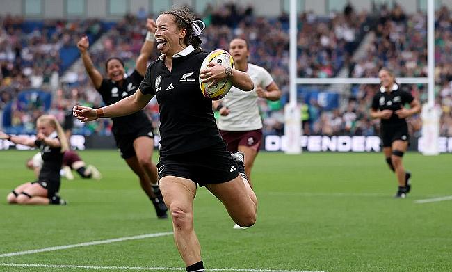 Renee Holmes of New Zealand runs with the ball to go on and score a try which is later disallowed following a TMO review