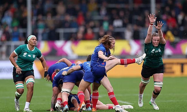 Pauline Bourdon Sansus of France kicks the ball clear from a ruck